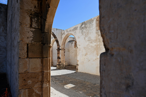 Betancuria, Fuerteventura, Spain, February 16, 2024 - The ruins of the former Franciscan monastery Convento de San Buenaventura in Betancuria, Fuerteventura.