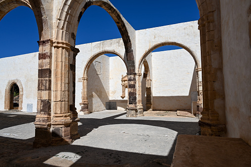 Betancuria, Fuerteventura, Spain, February 16, 2024 - The ruins of the former Franciscan monastery Convento de San Buenaventura in Betancuria, Fuerteventura.