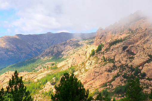 View of the mountains and the Corsican maquis at the foot of the Aiguilles de Bavella in the heart of Alta Rocca near Zonza, a meeting place for mountaineers from all over the world.