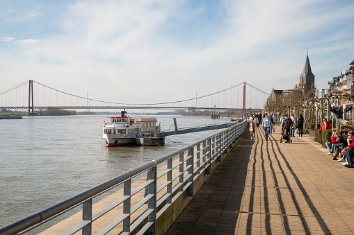 Emmerich, Germany, March 3, 2024; People walk on the Rhine promenade in the German city of Emmerich.