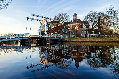 City Ouderkerk aan de Amstel with it's church and bridge. A small town near by Amsterdam

Ouderkerk aan de Amstel is a town in the province of North Holland, Netherlands. It is largely a part of the municipality of Ouder-Amstel; it lies about 9 km south of Amsterdam. A small part of the town lies in the municipality of Amstelveen. It is connected to Amsterdam by the river Amstel. There is another village called Ouderkerk in South Holland, Ouderkerk aan den IJssel.
Source: Wikipedia