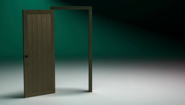 istock door with open wooden frame with green background with light effects in 3d render image, front view 2058662781