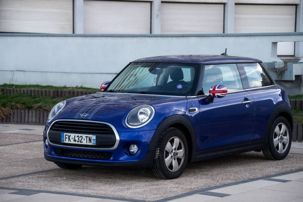 Malo les bains - France - 27 february 2024 - front view of blue mini cooper parked in the street