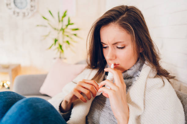istock Sick woman sitting at home 2058675149