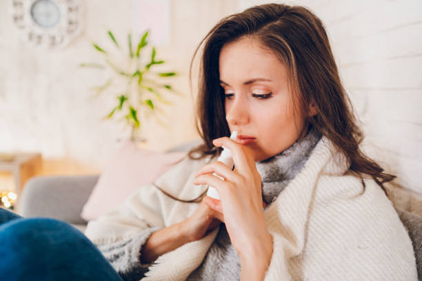 istock Sick woman sitting at home 2058675663