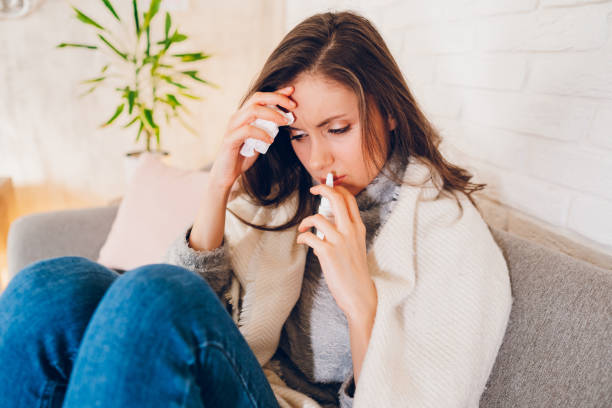 istock Sick woman sitting at home 2058676215