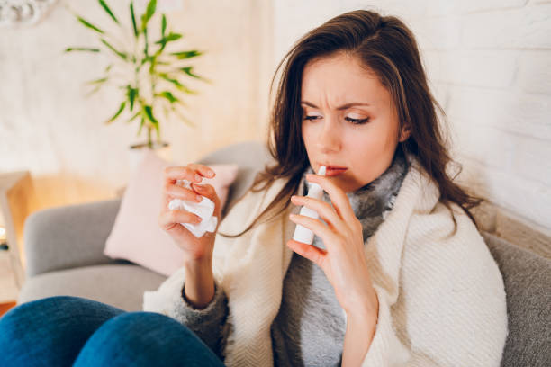 istock Sick woman sitting at home 2058679425