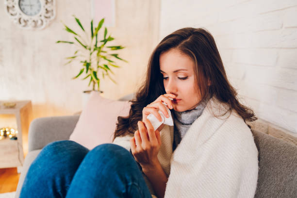 istock Sick woman sitting at home 2058679946