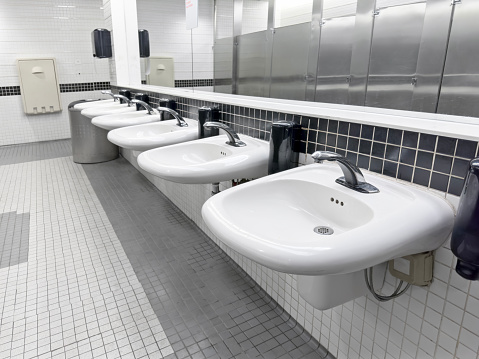 Sinks side by side in a public restroom