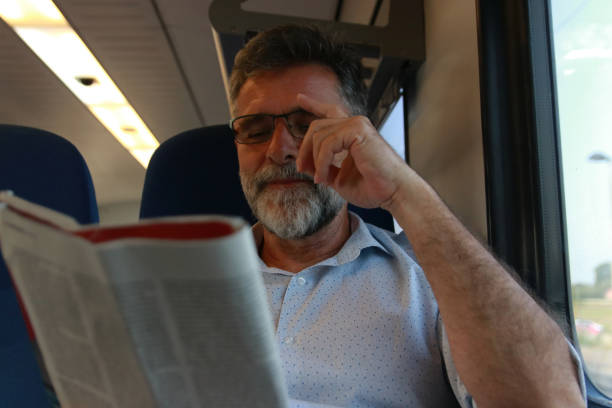 istock Mature man portrait in train 2058697123