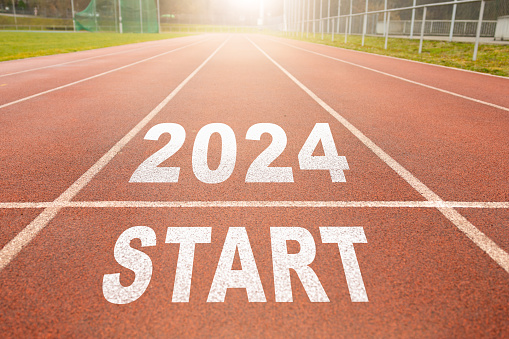 New beginnings concept. white starting line. word start and finish on a running track in a stadium. top view. Business goal and target concept. Start a new chapter concept.