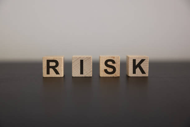 istock Financial risk management concept. Blocks of wood cubes. 2058714905