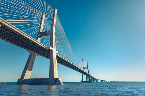 blue cable stayed bridge closeup, upward view