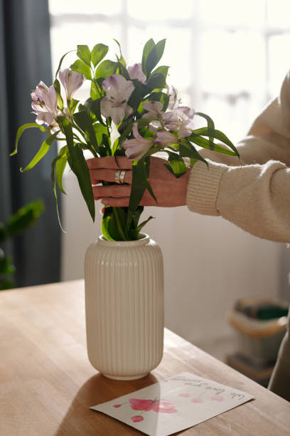 istock Female florist with fresh flowers 2058744357