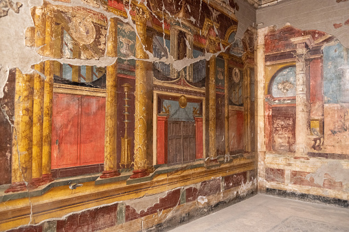 Scenic frescos on the wall of famous Villa Oplontis, ancient Roman villa and world heritage sight, Southern Italy