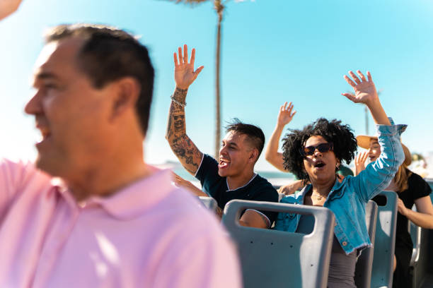 istock Tourists having fun on tourist bus 2058786751