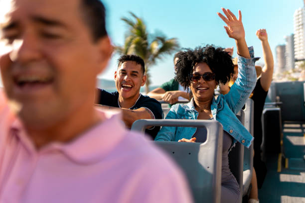 Tourists having fun on tourist bus