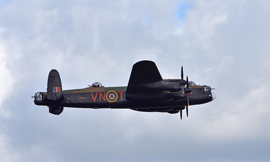 Ickwell, Bedfordshire, England - July 02, 2023: Vintage Avro Lancaster world war 2 bomber in flight.
