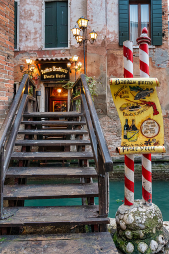 Venice, Italy- Feb 25, 2023:  Antica Trattoria Poste Vecie restaurant in Venice Italy.