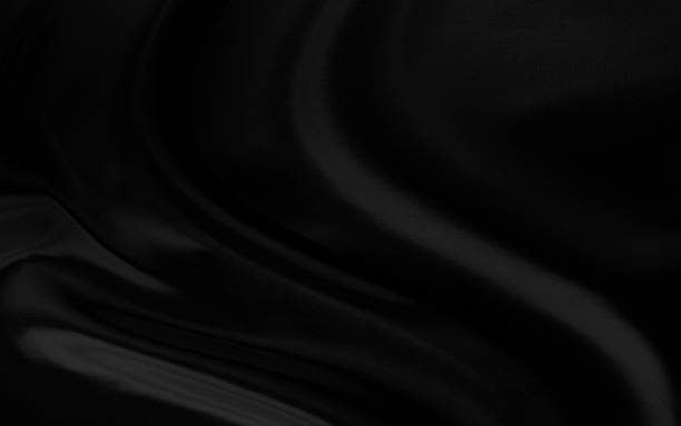 istock Black gray satin dark fabric texture luxurious shiny that is abstract silk cloth background with patterns soft waves blur beautiful. 2058821386