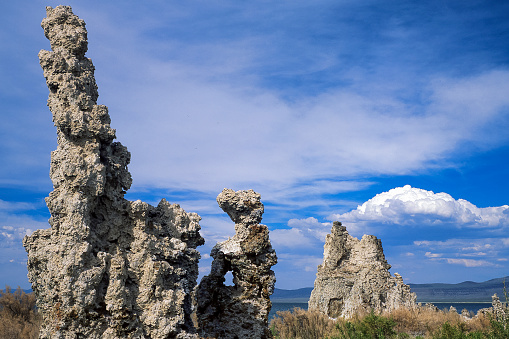 View of tufa formation on the bank of Mono Lake. Tufa is a variety of limestone formed when carbonate minerals precipitate out of water in unheated rivers or lakes.\n\nTaken at Mono Lake, California, USA