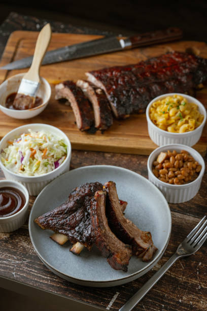 istock bbq spare ribs with side dishes 2058880122