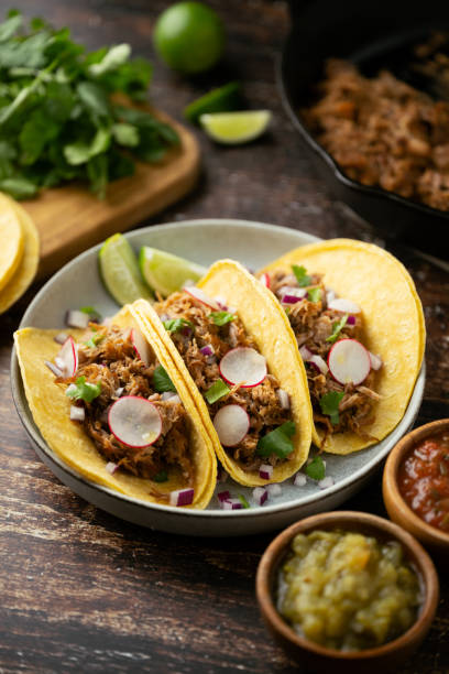 istock carnitas tacos with salsa and lime 2058899172