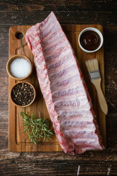 istock raw pork spare ribs on wooden board 2058924978