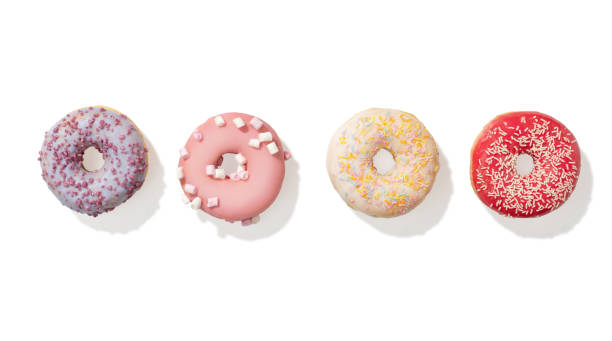 istock Pink donuts with glaze on a white isolated background 2058925734
