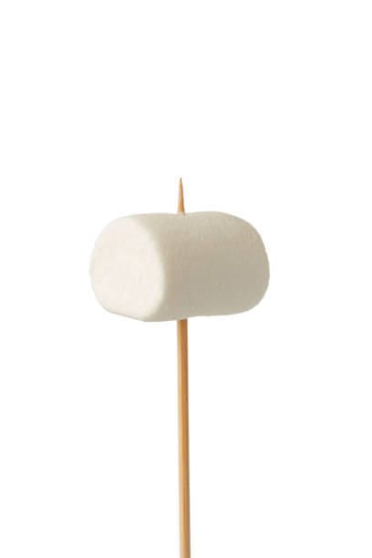 istock White marshmallows on a stick on a white isolated background 2058931562