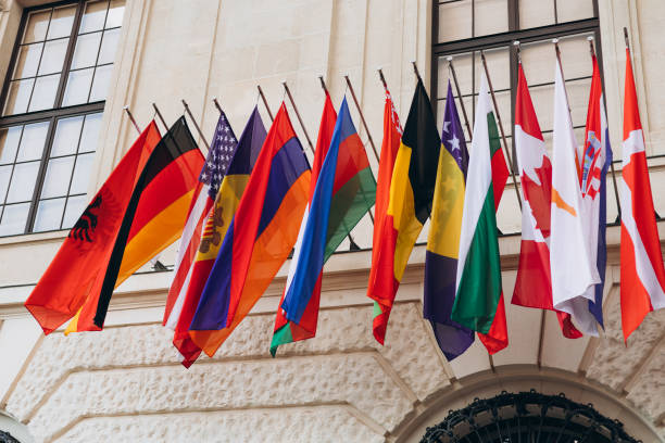 istock National flags of various countries flying in the wind. Colorful flags from different countries. Flags Organization for Security and Co-operation in Europe 2058950695