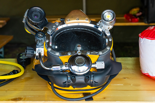 Yellow diving helmet with camera and light for special military operations