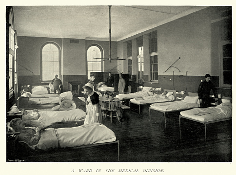 Vintage picture Nurse and patients, Medical Ward, Royal Victoria Hospital or Netley Hospital, Nurse, Victorian Healthcare, 1890s, 19th Century. The Royal Victoria Hospital or Netley Hospital was a large military hospital in Netley, near Southampton, Hampshire, England