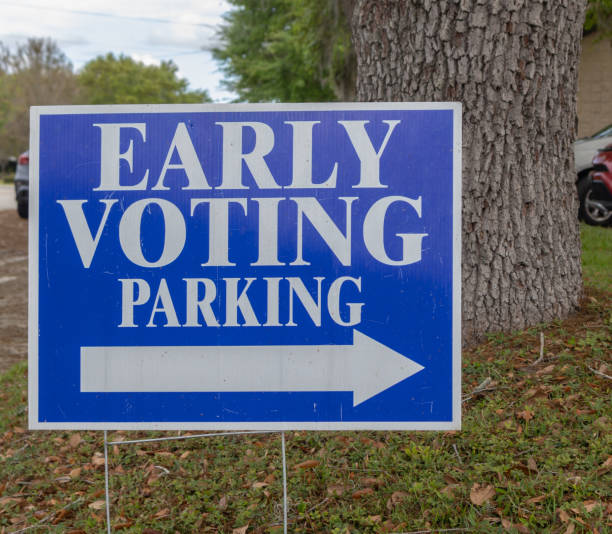 istock Early Voting Parking sign with white arrow 2059032431