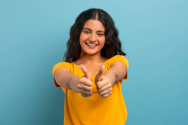 istock Positive young hindu lady showing thumb ups 2059046975