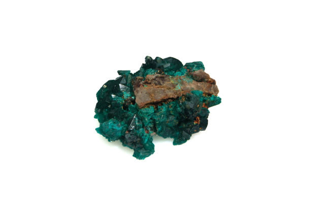 istock natural green dioptase rough gem on the background 2059080900