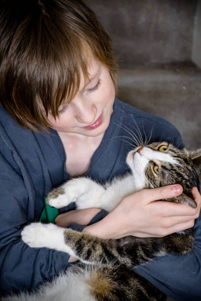 istock Embracing Diversity with an  Non-Binary Child with autism and Their Three-Legged Cat 2059082986