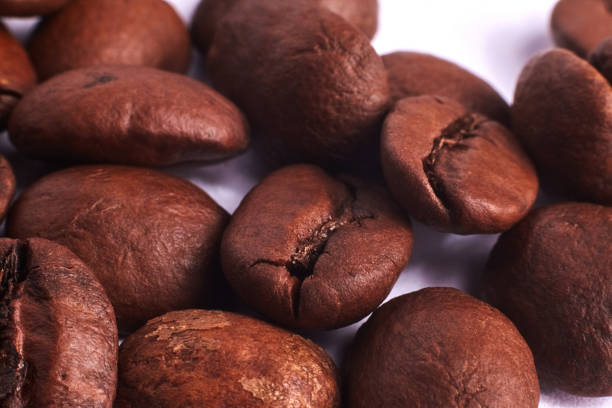 Close up of roasted coffee beans background.