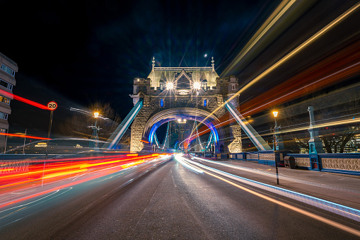 Traffic Crossing Tower Bridge, London, UK