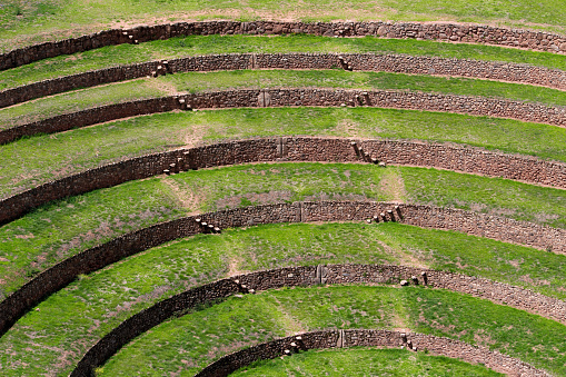 his image captures the ancient Andean terraces near Cusco, Peru, a marvel of pre-Columbian agricultural engineering. These terraces were designed to maximize arable land area in mountainous regions, improve irrigation, and prevent erosion, demonstrating the advanced understanding the Incas had of their environment