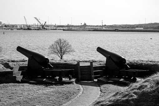 Baltimore, USA - February 18, 2024. Cannons at Locust Point of Baitmore Harbor, Fort McHenry National Monument and Historic Shrine, Baltimore, Maryland, USA