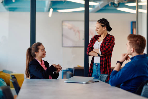 istock A team of successful programmers sits in a startup office, strategizing new business projects and solving existing challenges, showcasing innovation and collaboration in the tech industry 2059268019