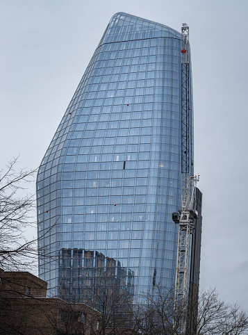 London, UK - Dec 25, 2023 - View of One Blackfriars high-rise building also known as The Vase or The Boomerang due to its shape at South bank district in Central London. Space for text, Selective Focus.