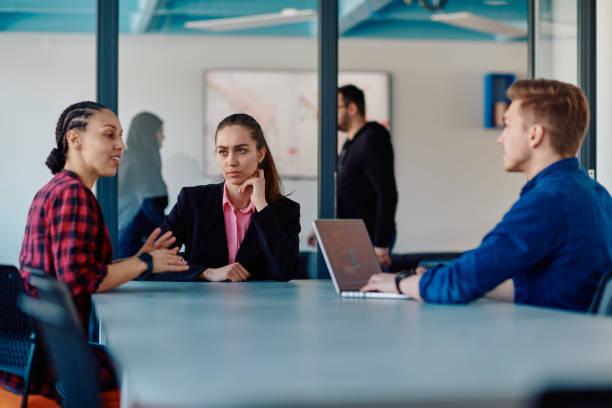 istock A team of successful programmers sits in a startup office, strategizing new business projects and solving existing challenges, showcasing innovation and collaboration in the tech industry 2059366893