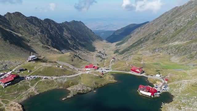 Transfaragasan Mountain Road Pass and Lake Balea in Carpathians, Transylvania, Romania - Aerial 4k Circling