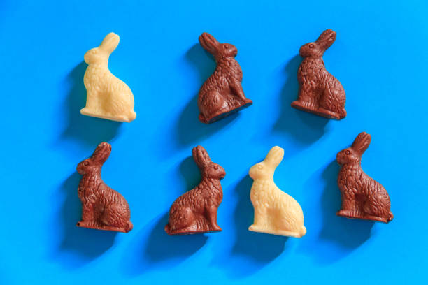 istock Easter chocolate bunnies on blue background. Top view 2059439835