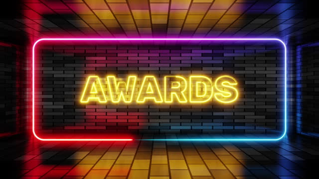 Neon sign awards in speech bubble frame on brick wall background 3d render. Light banner on the wall background. Awards loop congrats with trophy, design template, night neon signboard