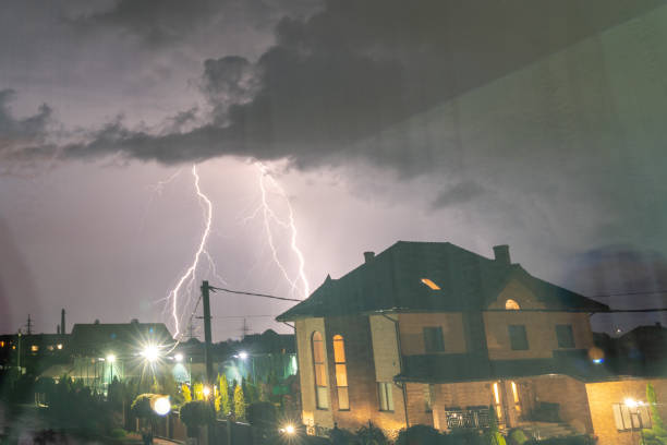 Bright lightnings over the city at the night.