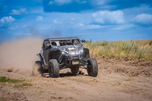 istock UTV in action offroad vehicle racing on sand dune. Extreme, adrenalin. 4x4. 2059469670
