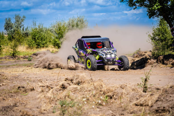 istock UTV vehicle offroad kicking up sand on dune. Extreme, adrenalin. 4x4. 2059469678